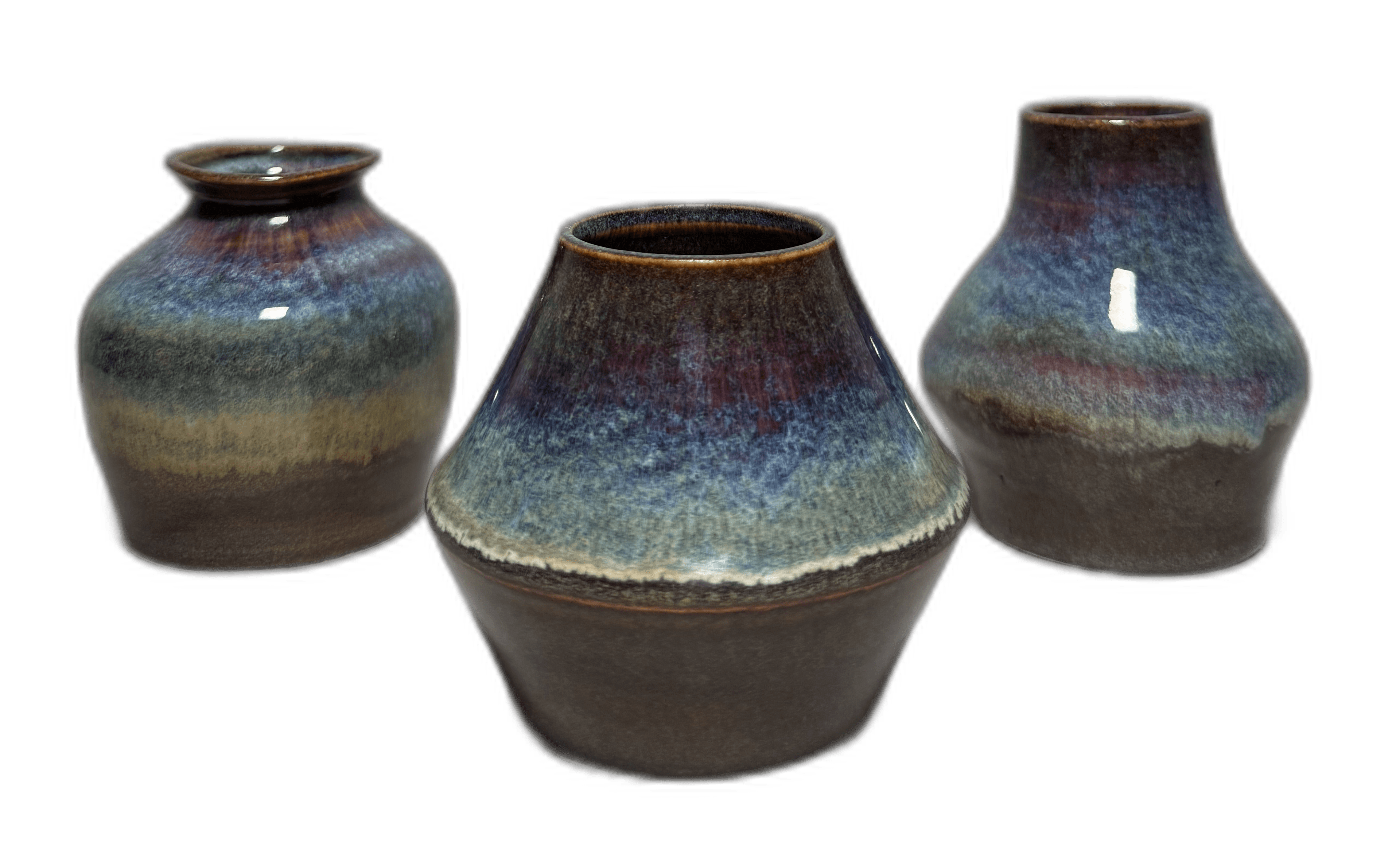 A second trio of blue-glazed ceramic vessels photographed in the studio